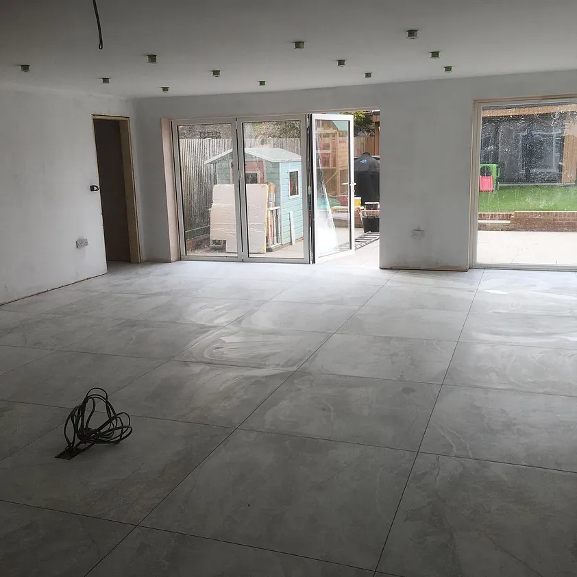 Porcelain tiles over underfloor heating in new extension